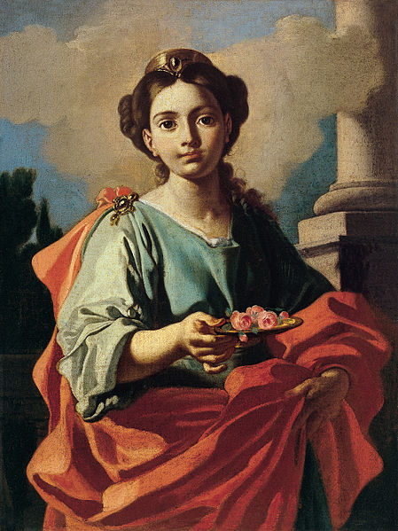 A female Saint holding a plate of roses